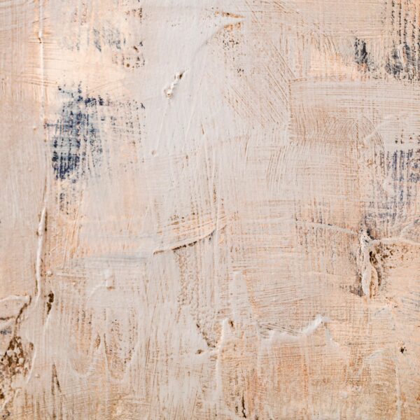 Abstract background rubbed with various shades of beige, cream , ivory and brown. Structured and wiped background